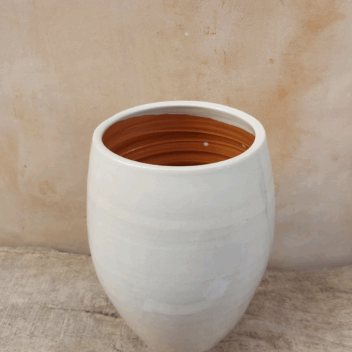 Witte terracotta voorraadpot